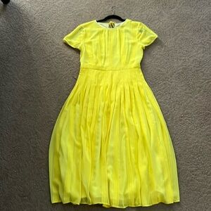 Jcrew size 6 dress. Back zip and tie closure.